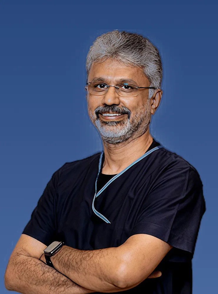 Dr. Saji John Mathews